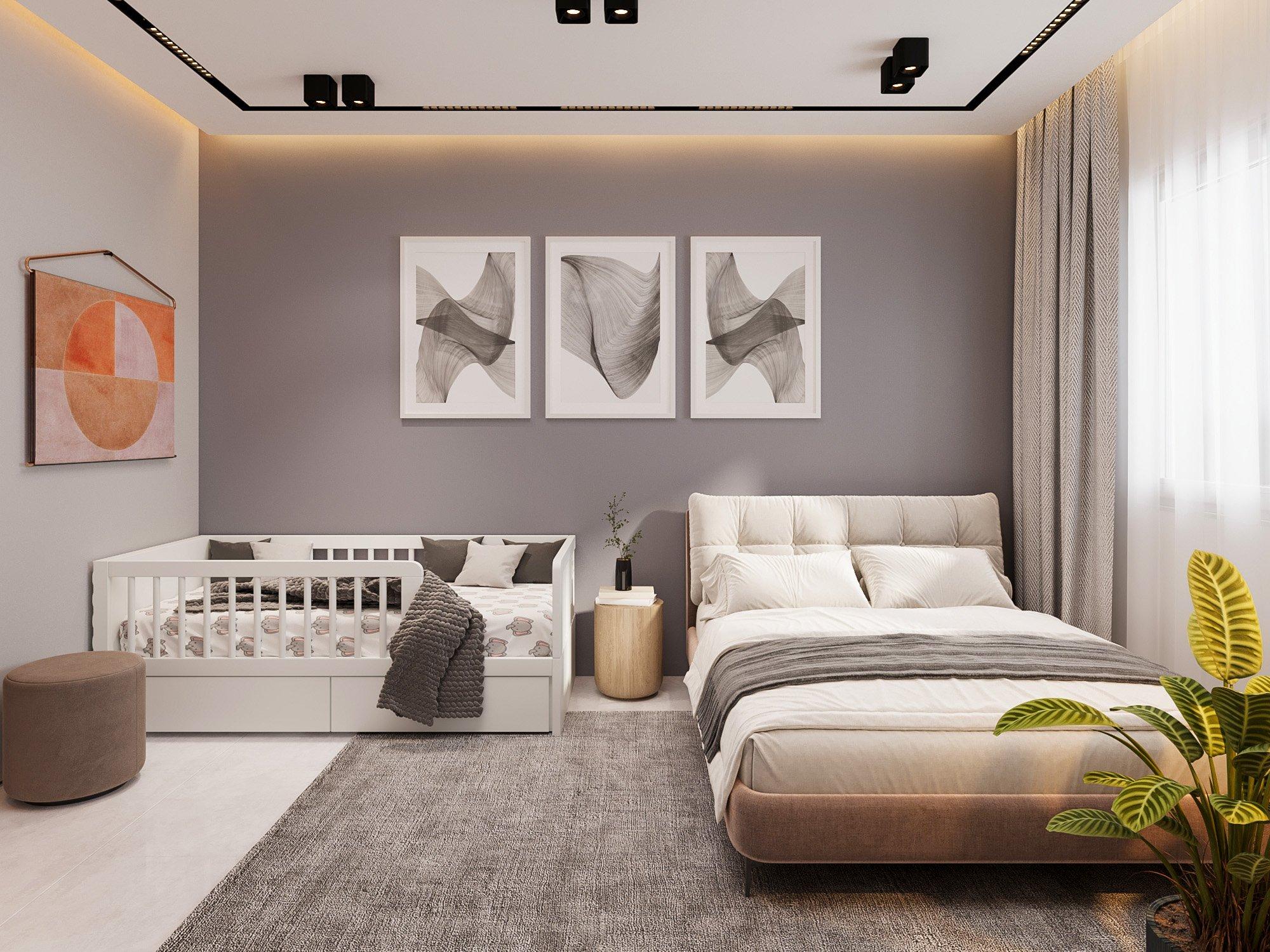 Master bedroom with a grey upholstered bed and three framed prints