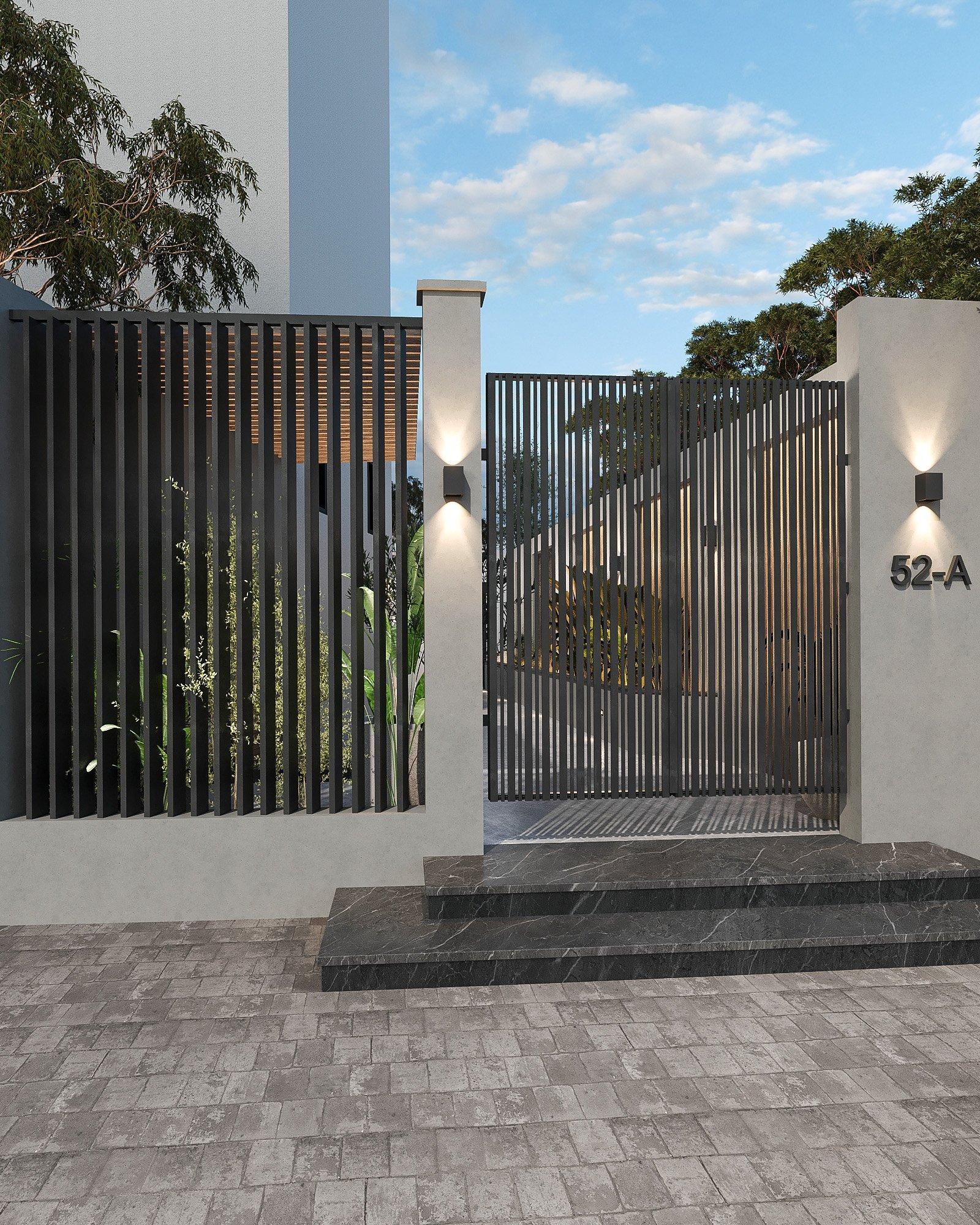 Front gate with black steel railings and stone steps