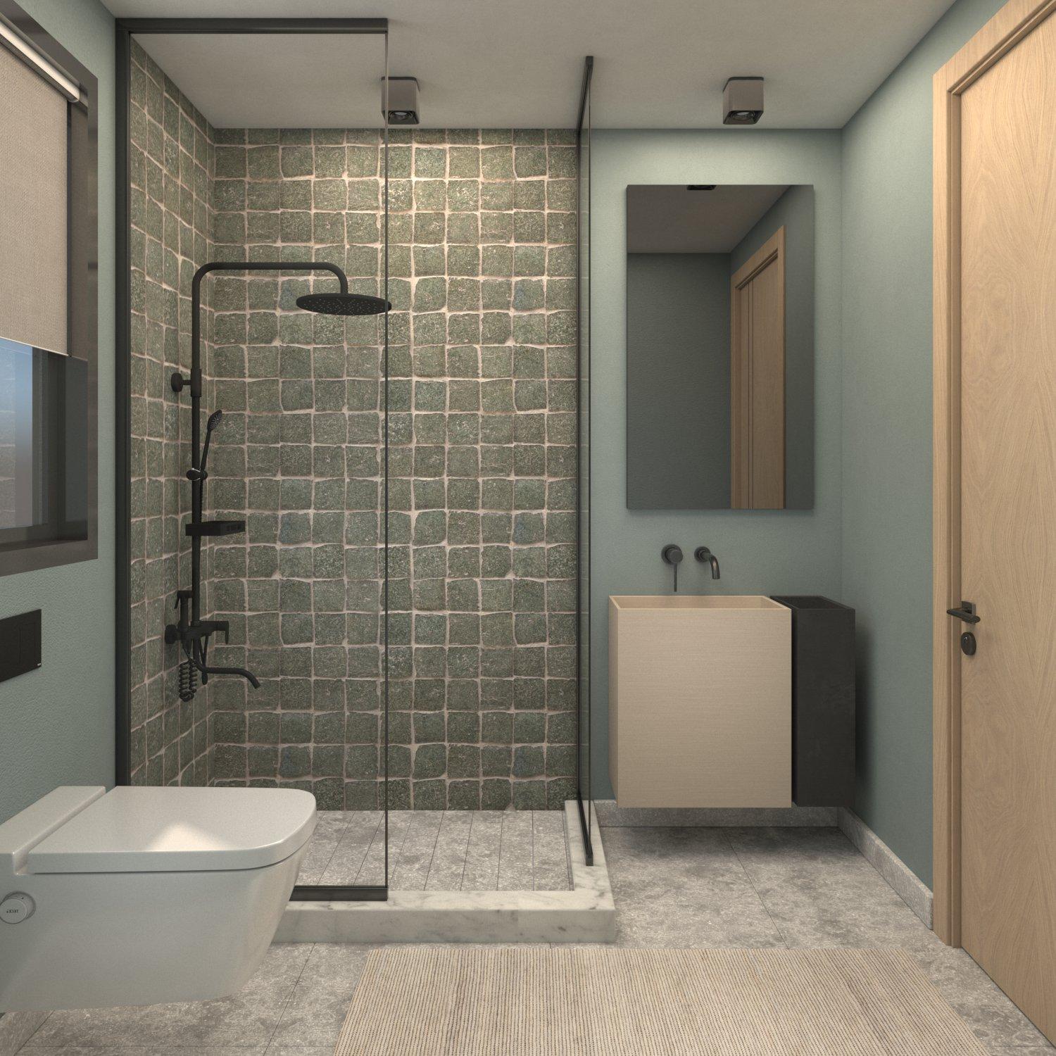 Bathroom with sage tiles, a glass shower and a wooden vanity